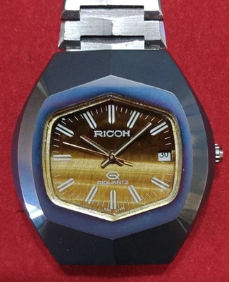 Montre RICOH REQUARTZ 591005 cadran oeil de tigre analogique date homme pile ... - Photo 1/4