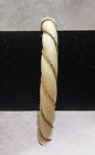 vintage white bangle bracelet with a gold chain accent