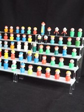 Varie bambole Fisher Price, molte figure di case giocattoli d'epoca