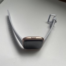 Fitbit Versa Smartwatch Fb504-SM Light Blue Band Rose Gold Case