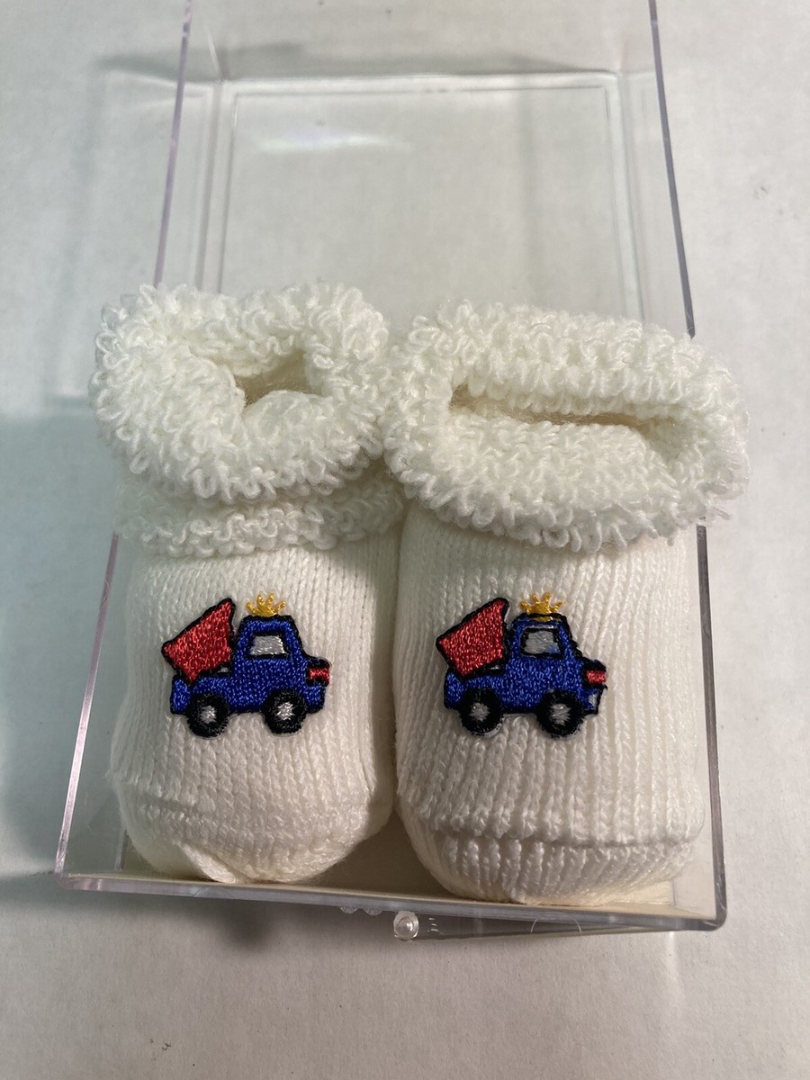 Newborn to three months baby booties dump trucks