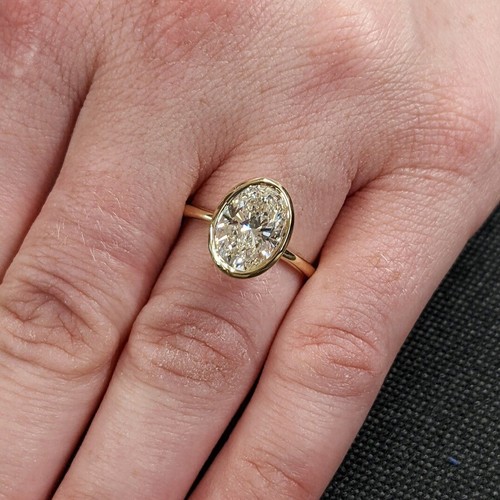 3.00Ct E VS1 Oval IGI Lab Grown Diamond Bezel Engagement Ring In 14K Yellow Gold - Picture 11 of 14