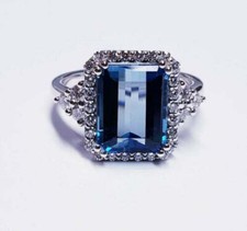Lab Created Emerald Cut Blue Sapphire With Halo Style Women's Engagement Ring