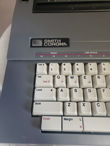 Máquina de escribir eléctrica portátil Smith Corona 5A SL 470 con cubierta probada y cinta nueva - Imagen 2 de 24
