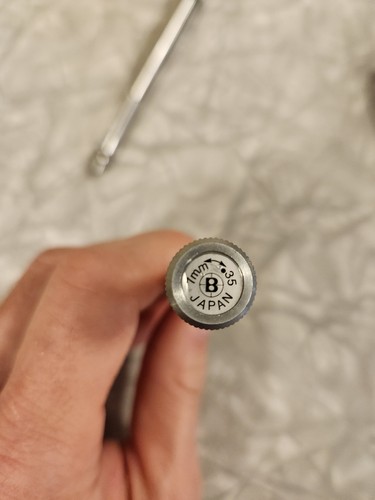 Bushnell Professional Bore Sighter 74-3002 with manual. Misssing one arbor - Picture 12 of 13