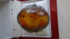 Beautiful Amber Stone Oval Ring Approximately 1.0" X 0.75" with Carving on Side
