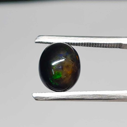 Natural Ethiopian Black Opal Oval Cabochon Stone 10*12 MM 3.7 CT - Picture 2 of 4