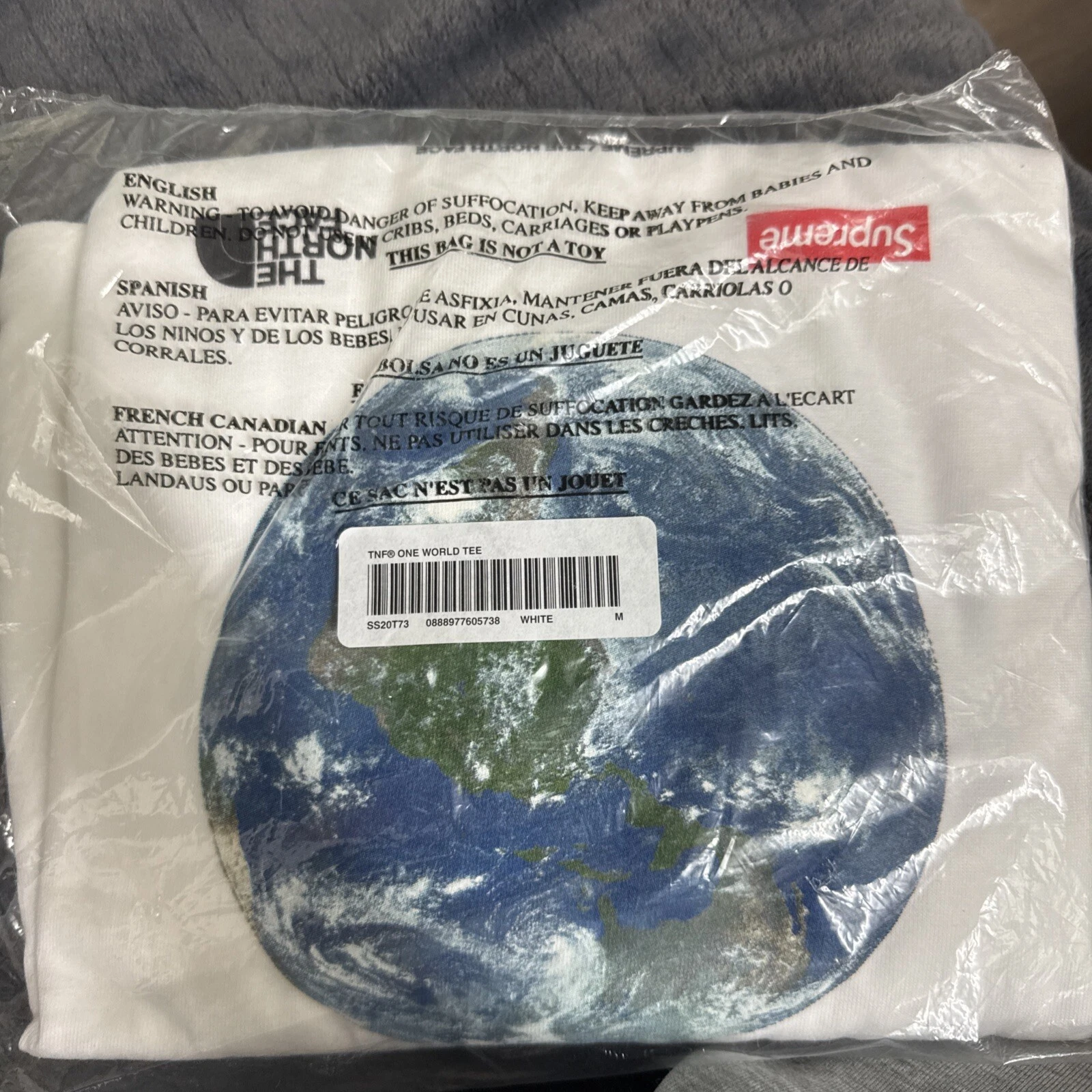 Tee shirt Supreme x The North Face One World / Blanc / Medium / Neuf ✅