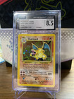 CGC 8.5 CHARIZARD BASE SET UNLIMITED HOLO RARE 4/102 POKEMON 1999 VINTAGE