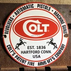 VINTAGE 1961 DATED COLT FIREARMS REVOLVERS PISTOLS GUNS 10” PORCELAIN GAS SIGN