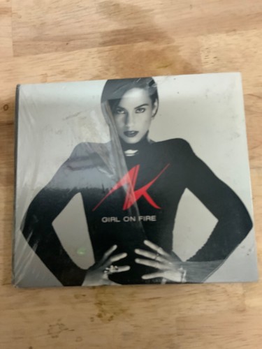 Girl on Fire [Digipak] by Alicia Keys (CD, Nov-2012, RCA)RIPPED PLASTIC - Foto 1 di 2