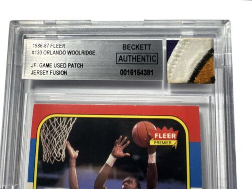 Tarjeta de baloncesto Fleer Orlando Woolridge 1986-87 parche usado juego novato #130 BGC - Imagen 3 de 5