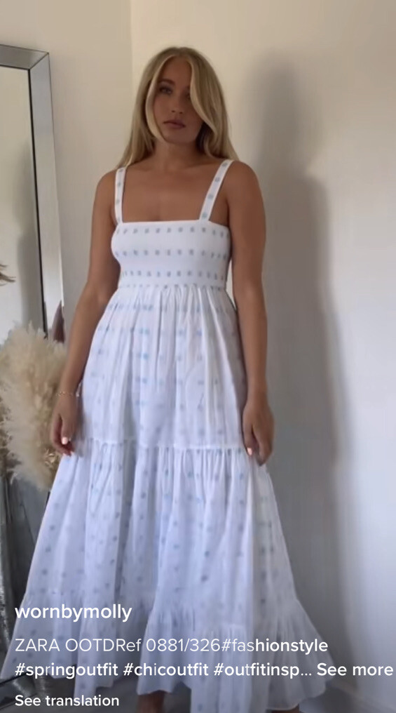 white dress with blue flowers