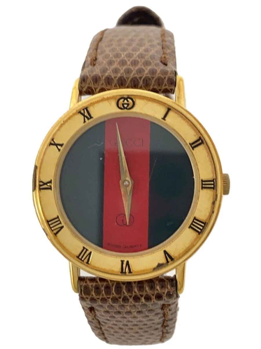 Gucci / Shelly Line / montre bracelet à quartz / analogique / marron / ceinture d'outre mer