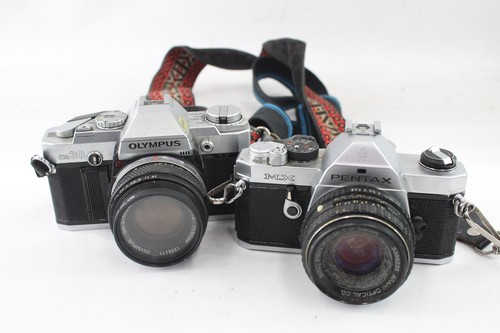 Cámaras fotográficas SLR vintage Inc Olympus OM30 y Pentax MX ambas con lentes x 2