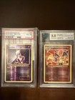 LOT DE 2*** Pokémon 2016 reverse Holo Charizard + Mewtwo Gradé 8