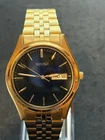 Seiko Men's Vintage Day/Date Gold Tone Quartz Watch 7N43-9048