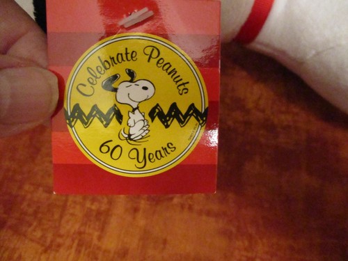 SNOOPY Plush PEANUTS 2009 Celebrate 60 Years Santa HAT Laying Down New with Tag - Picture 3 of 7
