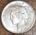 1925-P PEACE SILVER DOLLAR COIN ABOUT UNCIRCULATED