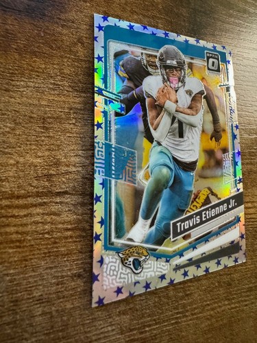 2023 Donruss Optic Travis Etienne Jr. Blue Stars Holo Prizm #86 SP Shortprint - Picture 3 of 8