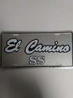 El Camino SS Silver background with white letter and black around outside letter