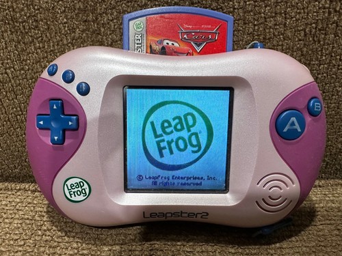 pink/ purple Leapfrog Leapster 2 and Leapster System and 5 games with cases - Picture 2 of 6