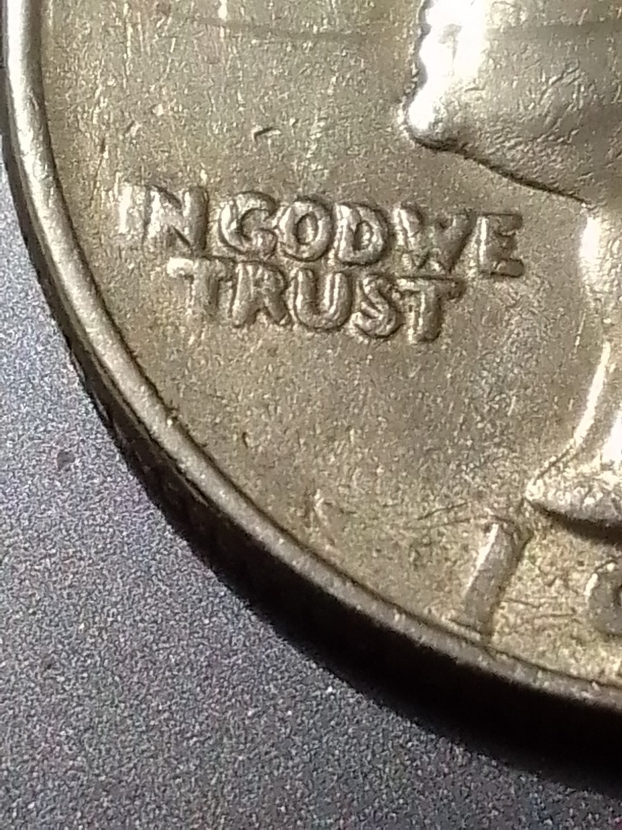 1986 Washington Quarter With Extra Leaf Under The Eagle and 1986 Washington Quarter With Extra Leaf Under The Eagle and
