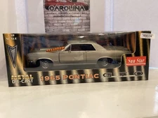 1:18 SUN STAR 1965 PONTAIC GTO TIGER GOLD ON BLACK MA# 2210