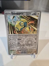 Dunsparce 079/131 Sv: Prismatic Evolutions Reverse Holo
