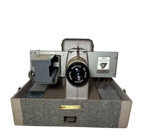 Proyector de diapositivas vintage Bell & Howell Co TDC Selectron Semimatic Headliner 303 - Imagen 1 de 16