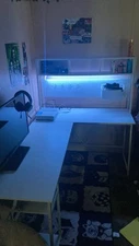 L-Shaped Gaming Desk with Monitor Shelves, LED Lights, and Power Outlets