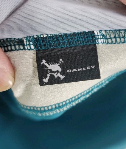 Camisa Polo Oakley Para Hombres 2XL Manga Corta Rendimiento Golf Activo Ligera Usada en Excelente Condición - Imagen 7 de 11