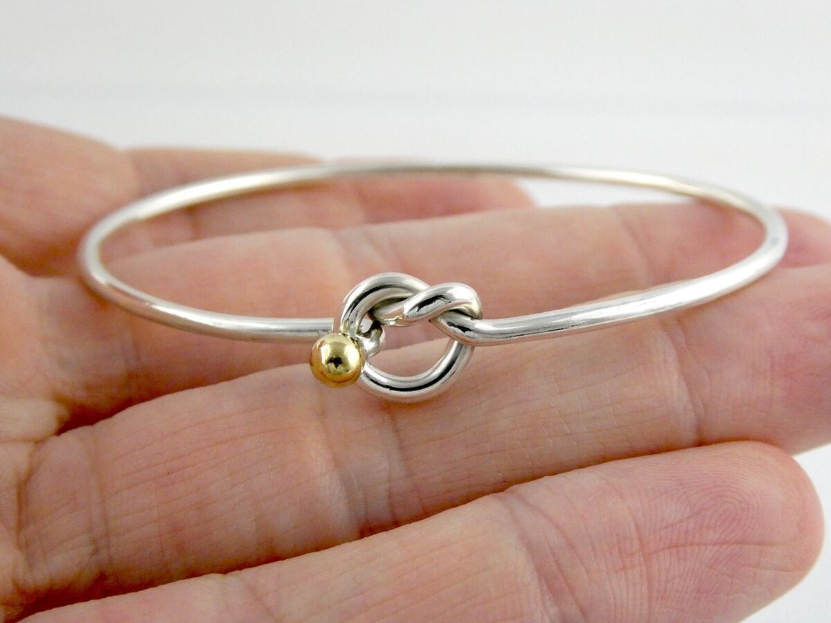 Tiffany and Co Sterling Silver and 18k Gold Love Knot Tiffany and Co Sterling Silver and 18k Gold Love Knot