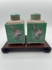 A Pair Of Green-Ground Famille Rose Square Floral Tea Caddies
