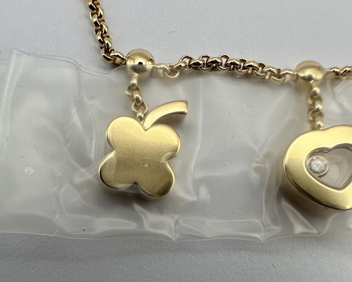 Chopard - a 'Happy Diamond' lucky charm bracelet in 18ct yellow gold - Picture 15 of 24