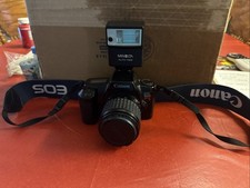 Canon EOS Rebel S 35mm SRL Camera W/ New Batteries And A Minolta Flash