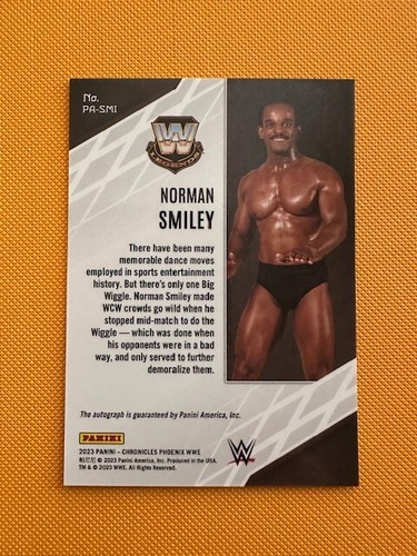2023 Panini Chronicles WWE - Phoenix Autographs Norman Smiley #PA-SMI (AU) - Picture 2 of 2