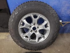 21 Wrangler Wheel 17x7-12 Wo Center Cap With New 2457517 Bridgestone Tire