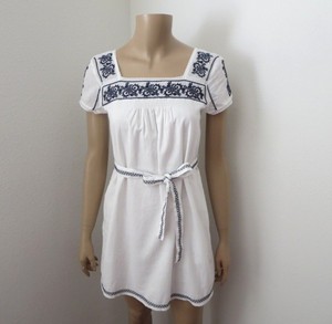 white cotton peasant dress