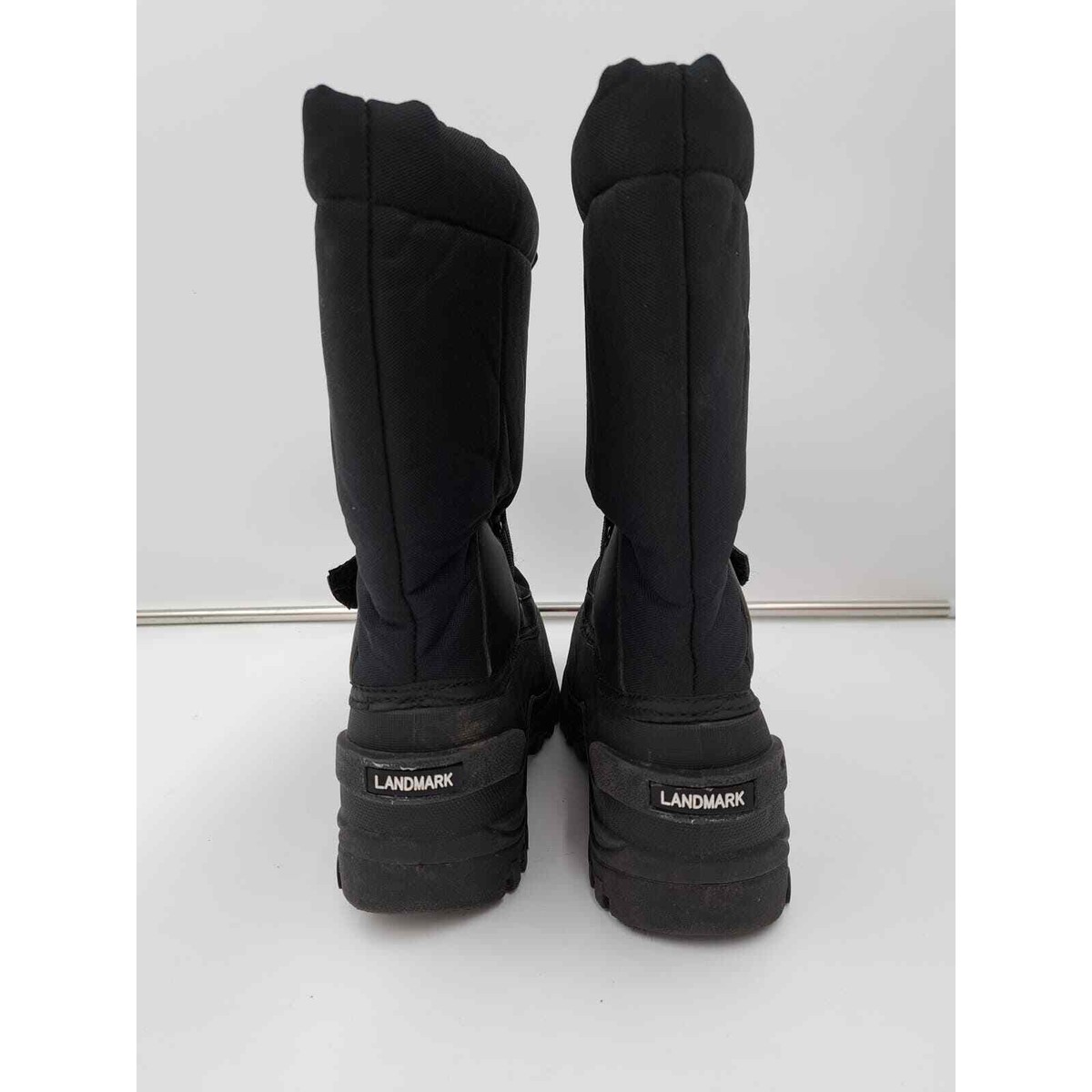 Landmark insulated snow boots showing detailed construction with Thermolite liners and waterproof materials