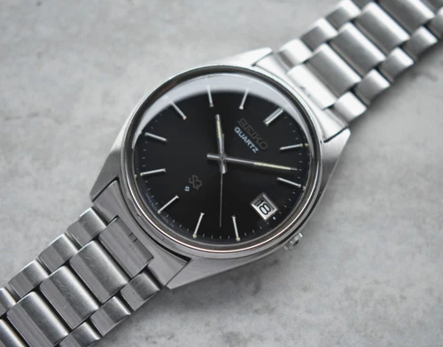 September 1980 Seiko Men's Watch Quartz Date Black Dial Steel Bracelet Sunburst