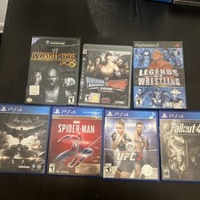 WWE, Fallout 4, Spider-Man & More – Mixed Console Game Bundle – $115