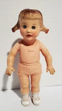 1955 Sun Rubber 9" tall baby girl doll wearing pigtails Pink Jumper Squeaker
