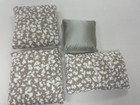 4 cushions, 3 in boiled wool, one in Satin. Different sizes