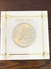1884-CC Morgan Silver Dollar ($1) 63 Uncirculated - Encased - 90% Silver