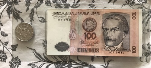 1967 Kennedy Half Dollar with 1987 Peru 100 Intis Banknote