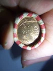WHEAT PENNY ROLL WITH A UNKNOWN BU WHEAT PENNY SHOWING