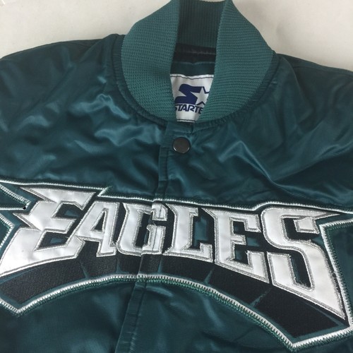 light blue shirt with grey jeans