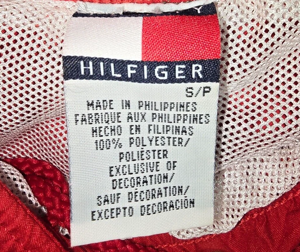 Pantalones deportivos a rayas TOMMY HILFIGER talla S de nailon rojo azul blanco usados en excelente estado Foto 2 de 4