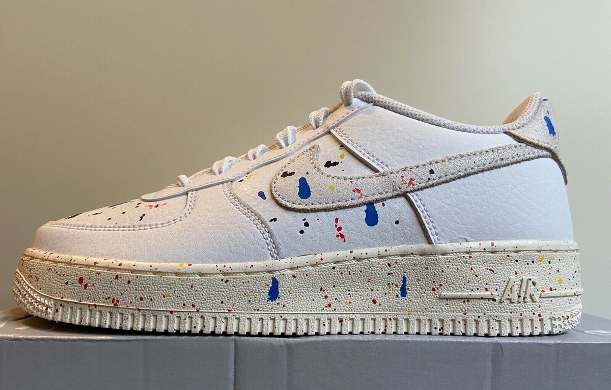 Nike air force basse bianche e argento hotsell